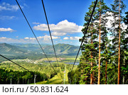 View of the lake Manzherok with chairlift. Стоковое фото, фотограф Александр Карпенко / Фотобанк Лори