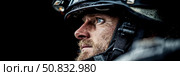 Profile of a weathered hero firefighter in helmet, Intense gaze and determination, reflecting courage and resilience in the face of adversity. Стоковое AI-изображение, AI-художник Данила Большаков / Фотобанк Лори