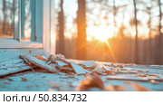 Dilapidation at Sundown: Crumbling Window Frame Illuminated by Golden Hour Sunlight. Стоковое AI-изображение, AI-художник Данила Большаков / Фотобанк Лори