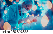 Anesthesiologists Vigil: Medical Professional Administering Care with Glowing Ambience. Стоковое AI-изображение, AI-художник Данила Большаков / Фотобанк Лори