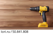 Cordless power drill on wooden surface with focus on construction tools. Стоковое AI-изображение, AI-художник Katsiaryna Repich / Фотобанк Лори