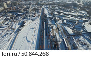 Город Киров - станция Киров-Котласский зимой (аэросъемка 2021 года) (2022 год). Стоковое видео, видеограф Владислав Самошкин / Фотобанк Лори