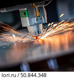 CNC Laser cutting of metal, modern industrial technology. Стоковое фото, фотограф Андрей Армягов / Фотобанк Лори