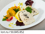 Codfish prepared on steam , served with boiled corn, herbs and lemon. Стоковое фото, фотограф Яков Филимонов / Фотобанк Лори