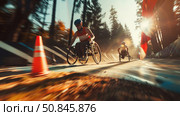 Wheelchair para-athletics competitions taking place on an open track in a pine forest. In the foreground, an athlete in a protective helmet and sportswear demonstrates strength, concentration and desire to win. Dynamics, movement, light accents and blurred leaves emphasize the speed and energy of what is happening. The image inspires and emphasizes the capabilities and strength of a person's spirit, regardless of limitations. Стоковое AI-изображение, AI-художник Анна Кривицкая / Фотобанк Лори
