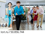 People dancing foxtrot during Christmas or New Year celebration. Стоковое фото, фотограф Яков Филимонов / Фотобанк Лори