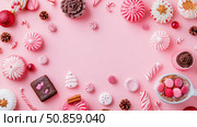 Christmas holiday sweet treats arrangement, pink surface, print, card, poster. Стоковое AI-изображение, AI-художник Данила Большаков / Фотобанк Лори