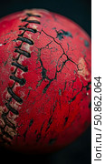 A Worn Baseball, Close-Up, Showing Texture and Wear. Стоковое AI-изображение, AI-художник Данила Большаков / Фотобанк Лори