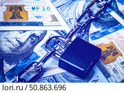 Dollar bills, black lock and metal chain. Money lock or security concept. Account lockout. Стоковое фото, фотограф Емельянов Евгений Викторович / Фотобанк Лори