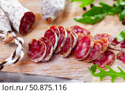 Sliced spanish sausage fuet. Стоковое фото, фотограф Яков Филимонов / Фотобанк Лори