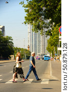 Pedestrians cross Stromynka Street using a pedestrian crosswalk. Russia. Moscow. 07/25/25. Стоковое фото, фотограф Ярославский Максим / Фотобанк Лори