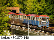 The metro train leaves the tunnel for the Preobrazhensky metro bridge. Russia. Moscow. 25.07.25. Редакционное фото, фотограф Ярославский Максим / Фотобанк Лори