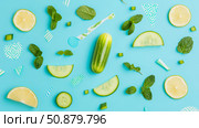 Refreshing Summer: Cool cucumber, lemon, and mint flatlay arrangement on a bright aqua surface for wellness and healthy living. Стоковое AI-изображение, AI-художник Данила Большаков / Фотобанк Лори