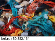 Discarded fishing nets and plastic debris polluting the beach, highlighting environmental damage. Стоковое AI-изображение, AI-художник Иван Рябоконь / Фотобанк Лори