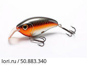Fishing lure with treble hooks resting on white background. Стоковое AI-изображение, AI-художник Иван Рябоконь / Фотобанк Лори