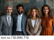 Portrait of a successful and friendly team of professionals against the backdrop of a modern office interior. Four people of different ages in business clothes are smiling, creating an image of unity, trust and a positive corporate culture. Ideal for topics related to business, career, management, HR, coaching and corporate communications. Стоковое AI-изображение, AI-художник Анна Кривицкая / Фотобанк Лори