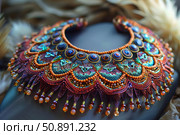 Colorful beaded necklace embracing elegance and craftsmanship. Стоковое AI-изображение, AI-художник Иван Рябоконь / Фотобанк Лори