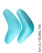 Two blue textured grips with angular triangular design for indoor bouldering and training walls, isolated on white background for climbing gyms. Стоковое фото, фотограф Татьяна Терехина / Фотобанк Лори