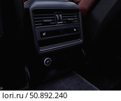 Novosibirsk, Russia -  July 14, 2025: Porsche Cayenne,  close up deflector,  car ventilation system for rear seats. Car air conditioner. Редакционное фото, фотограф Виталий Сова / Фотобанк Лори