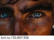 Close up portrait of man with dirty face reflecting peace symbol in eyes. Стоковое AI-изображение, AI-художник Иван Рябоконь / Фотобанк Лори