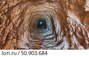 The Enigmatic View of the Underground Tunnel Awaits the Adventurous Explorers Gaze. Стоковое видео, видеограф Vladimir Vintonjak / Фотобанк Лори