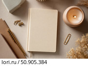 Back to life, goal list concept. Woman's hand writing in empty notebook on wooden table. Resolutions, plan, goals, checklist, idea concept. Top view, flat lay, copy space. 2026. Christmas, New Year. Стоковое AI-изображение, AI-художник Марина Демидюк / Фотобанк Лори