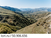 Landscape of Dagestan mountains, mountain range in haze summer Russia. Стоковое фото, фотограф Spirit River / Фотобанк Лори