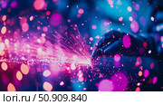 Artistic depiction of Metal work: Abstract display of sparks and bright light emanating from metal welding process in shades of pink, blue and magenta. Стоковое AI-изображение, AI-художник Данила Большаков / Фотобанк Лори
