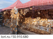 Handicrafts made of birch bark and wood. Souvenir thematic products on shelves of city market in Viborg. Редакционное фото, фотограф Мария Паина / Фотобанк Лори