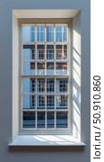Light and Shadow through a Pane: Interior with a Traditional Window Featuring Reflected Facade, Sunlight and Minimalist Wall. Стоковое AI-изображение, AI-художник Данила Большаков / Фотобанк Лори