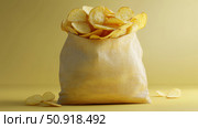 salty bag of potato chips ai generated. Стоковое AI-изображение, AI-художник Vectorwin / Фотобанк Лори