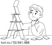 Метафора тщетности усилий. Человек пытается построить карточный домик, который постоянно рушится, символизируя хрупкость его надежд и отсутствие стабильности. Стоковое AI-изображение, AI-художник Ирина Першина / Фотобанк Лори