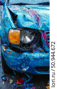 Automobile Accident: Damaged Blue Auto Front End Showing Destruction After a Crash, Depicting Safety Concerns and Repair Needs. Стоковое AI-изображение, AI-художник Данила Большаков / Фотобанк Лори