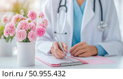 Healthcare Concept: A Doctor's Desk with Pink Carnations Promoting Wellness and Compassionate Care. Стоковое AI-изображение, AI-художник Данила Большаков / Фотобанк Лори