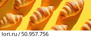 A vibrant display of croissants positioned in an abstract pattern on a lemon yellow backdrop. This artistic arrangement highlights the crisp texture and delicious appeal of the pastries. Стоковое AI-изображение, AI-художник Nart / Фотобанк Лори