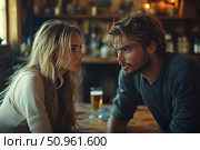 A man and a woman are engaged in a tense dialogue in a cozy bar or cafe. The setting is warm and atmospheric, with soft side light and a blurred background with bottles and subdued lighting. The frame feels emotionally charged: perhaps a conversation on an important topic or an argument between lovers. Ideal for illustrating themes of communication, conflict, relationships, romance or drama. Стоковое AI-изображение, AI-художник Анна Кривицкая / Фотобанк Лори