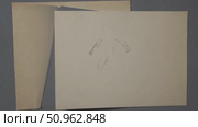 Beige paper sheets partially overlapping white background, forming minimalist geometric arrangement against neutral gray surface, creating abstract artistic composition. Стоковое AI-видео, аниматор Данил Руденко / Фотобанк Лори