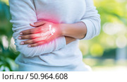 Health concept: Woman Holding Wrist with Pain Indication, wrist joint inflammation with pain or arthritis, design for health advertising, medical treatment. Стоковое AI-изображение, AI-художник Данила Большаков / Фотобанк Лори