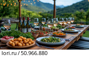 Exquisite al fresco dinner setup on rustic wooden table, featuring sparkling wine glasses, gourmet food, illuminated by twinkling lights in beautiful mountain landscape, ideal for memorable summer fe. Стоковое AI-изображение, AI-художник Данила Большаков / Фотобанк Лори