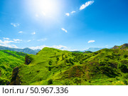 Picturesque mountain view of idealistic landscape of green mountains with deep rocky gorge in sunny weather. North Caucasus. Стоковое фото, фотограф Константин Лабунский / Фотобанк Лори