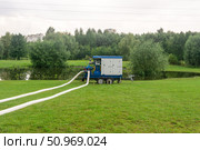 Pumping water out of a park flooded during the rains. Стоковое фото, фотограф Евгений Харитонов / Фотобанк Лори