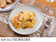 Italian casserole made from filo dough, lightly salted salmon and broccoli cabbage. Стоковое фото, фотограф Яков Филимонов / Фотобанк Лори