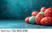 Vibrant red and teal speckled eggs clustered on a textured blue surface, surrounded by ethereal orange bokeh lights, creating an abstract and festive atmosphere. Стоковое AI-изображение, AI-художник Данила Большаков / Фотобанк Лори