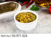 Souce gherkin relish with marinated cucumbers. Стоковое фото, фотограф Андрей Старостин / Фотобанк Лори