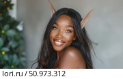 Radiant close-up of a delightful dark-skinned fantasy character with prominent elven ears and a captivating, joyful smile. Стоковое AI-видео, аниматор Данила Большаков / Фотобанк Лори