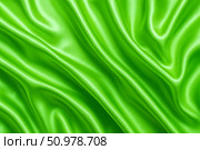 Green silk satin fabric background with shiny flowing folds, elegant surface, luxury textile texture for fashion, spa, wedding, creative design. Стоковое AI-изображение, AI-художник Павел Муравьев / Фотобанк Лори