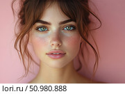 Portrait of a young woman with expressive blue eyes, thick eyebrows and natural freckles on her face. The soft pink background emphasizes the freshness and natural beauty of the model. Her gaze is full of depth and confidence, creating a feeling of sincerity and openness. Perfect for beauty, cosmetics, skin care, femininity and naturalness themes. Стоковое AI-изображение, AI-художник Анна Кривицкая / Фотобанк Лори
