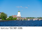 Medieval castle in Vyborg and St. Olav Tower. Редакционное фото, фотограф Мария Паина / Фотобанк Лори