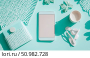 Flatlay: Mint Green Aesthetic with Smartphone, Knitwear, and Coffee Cup. Стоковое AI-изображение, AI-художник Данила Большаков / Фотобанк Лори