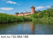 View of the Spaso-Evfimiev Monastery (a monastery of the Vladimir Diocese of the Russian Orthodox Church) on the bank of the Kamenka River on a sunny summer day, Suzdal, Vladimir region, Russia. Стоковое фото, фотограф Ula Ulachka / Фотобанк Лори